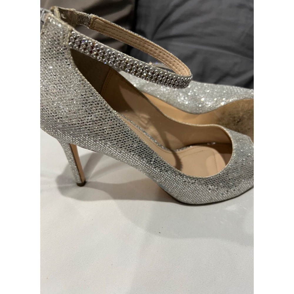 Nina heels in sliver with rhinestone small 2 inch heel has a zip opening in the